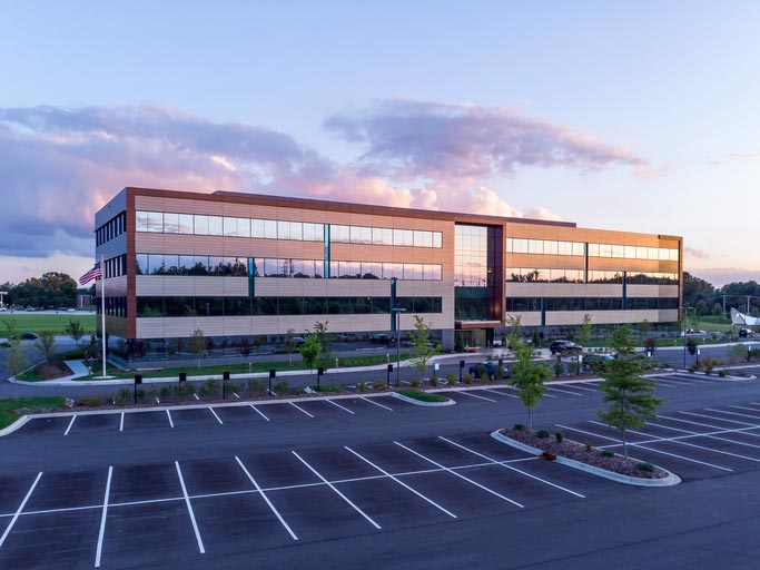 Office Building Exterior with Parking Lot